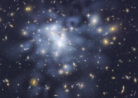 Scientists have proposed a new form of particle in dark matter theory (Photo: Abell 1689, a galaxy affected by gravitational lensing theorized to be amplified by dark matter. NASA JPL/Caltech and STScI)