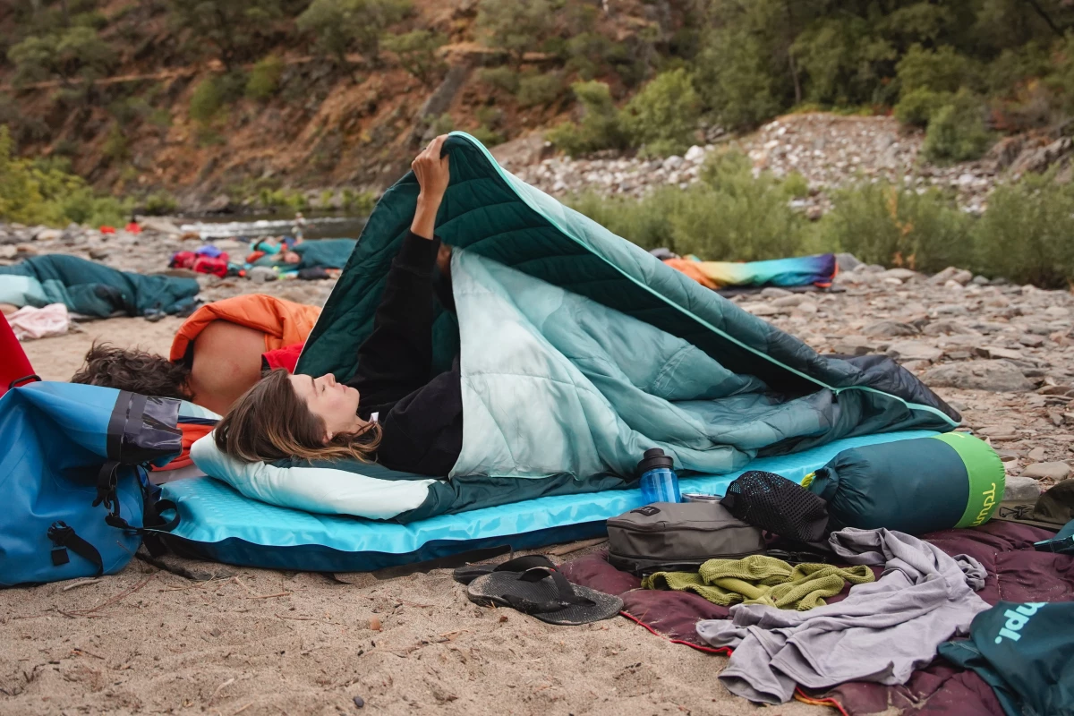 Rumpl's new dual-wing Wrap Sack design creates a multi-layer outdoor bedding set that provides more room and adjustability