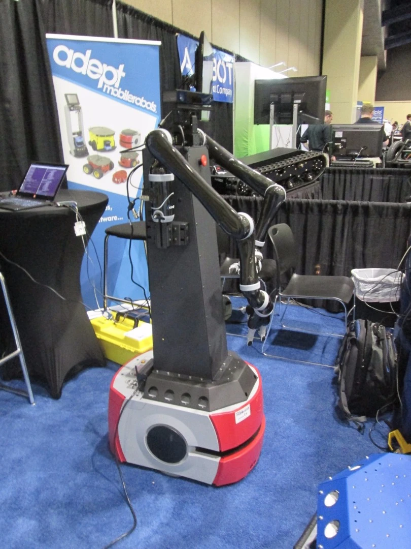 An Adept robot with manipulator tower