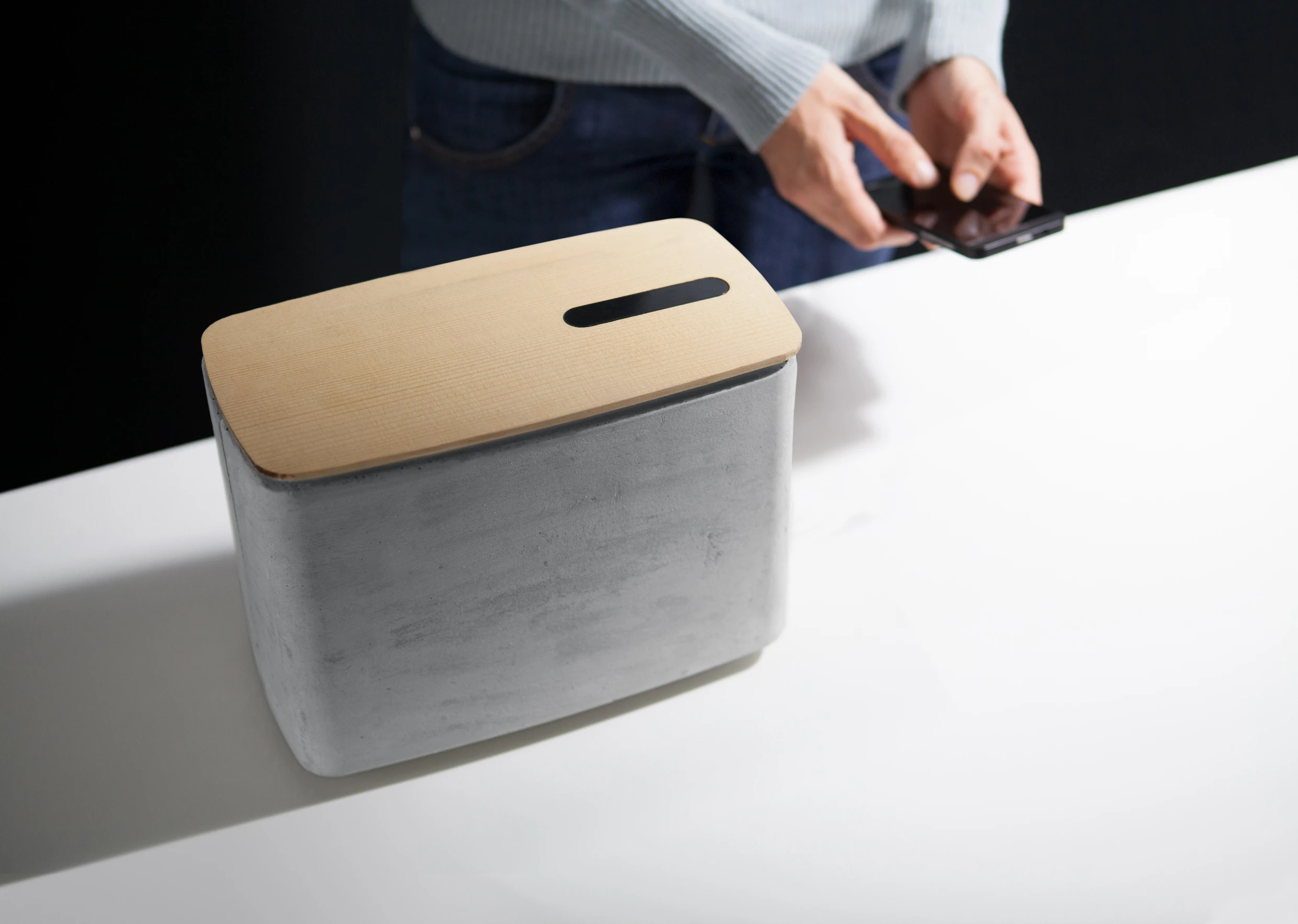 There's no audio input jack, music is streamed to the speaker wirelessly over Bluetooth from a smartphone or media player