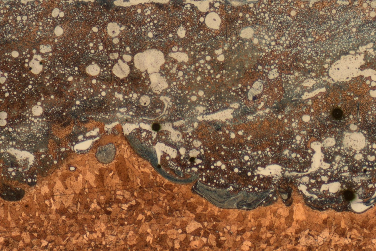 An image from a microscope reveals how the two metals, copper alloy and Inconel, mix and interlock to form a strong bond created by the innovative 3-D printing process during manufacturing of the igniter prototype