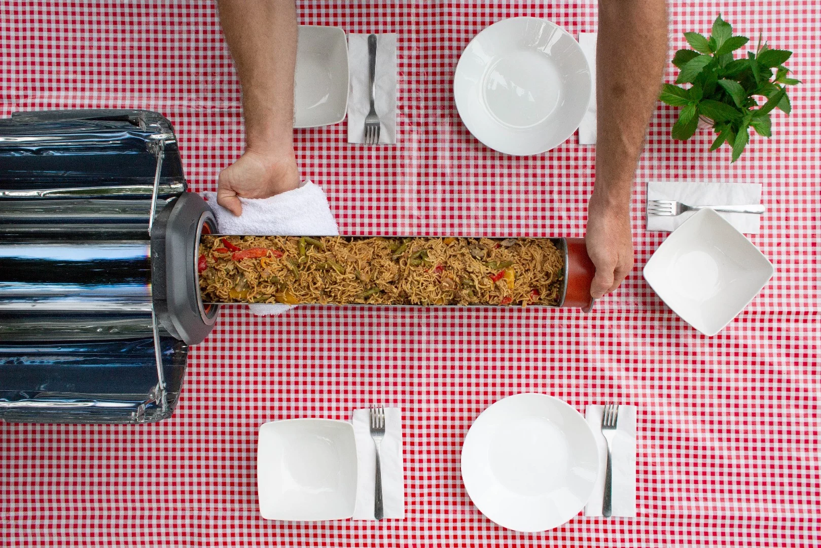 The GoSun Fusion has a 3.2 L (0.8 gal) cook tray, which should be enough for five full meals