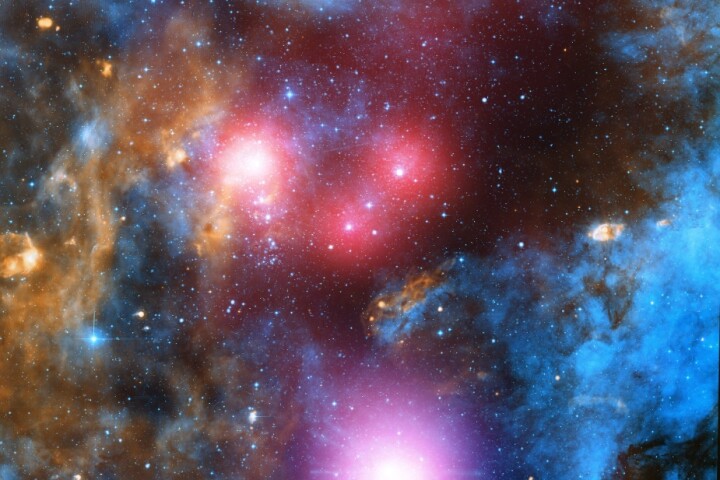 A composite image comprised of optical data from the Isaac Newton Telescope and X-ray data from Chandra showing the stellar association Cygnus OB2