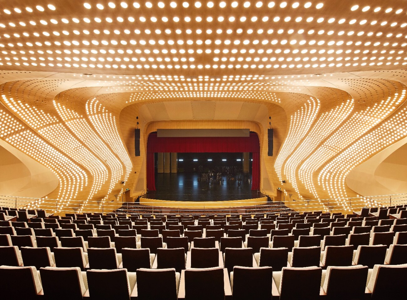 The Nanjing International Youth Cultural Centre includes a conference hall equipped with a multi-purpose stage suitable for conferences and theatrical events and an auditorium optimized for acoustic performances
