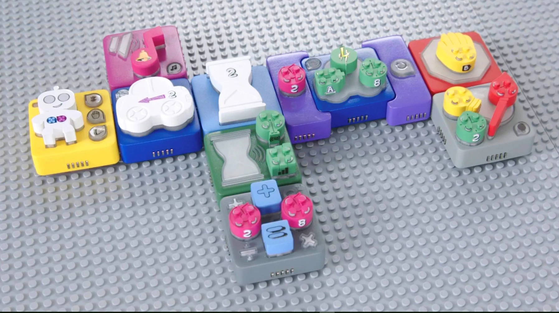 Algobrix function blocks are arranged in sequence to construct commands for the system's Lego-like robot to follow