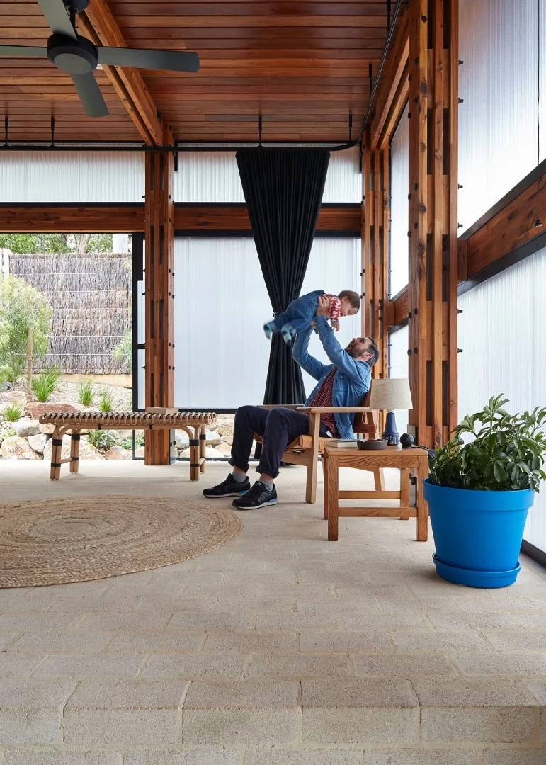 Dorman House's ground floor polycarbonate bedroom space can be opened to the outside with a sliding door