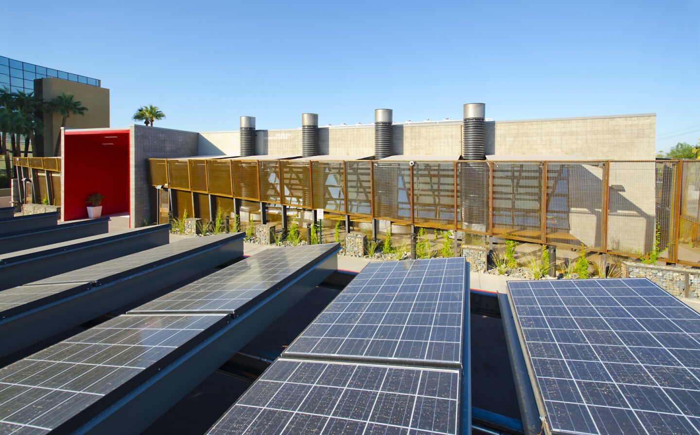 All the building's energy is produced by a 79.6 kW photovoltaic solar panel-covered parking lot (Photo: Gregg Mastorakos)