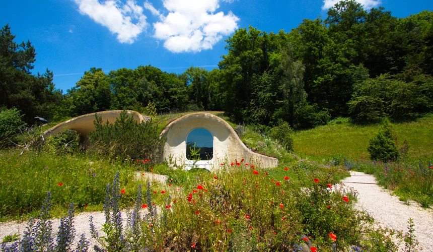 Peter Vetsch, a dominant force in earth house architecture, has built over 90 energy saving underground houses, with a strong nod to the organic forms of Gaudi
