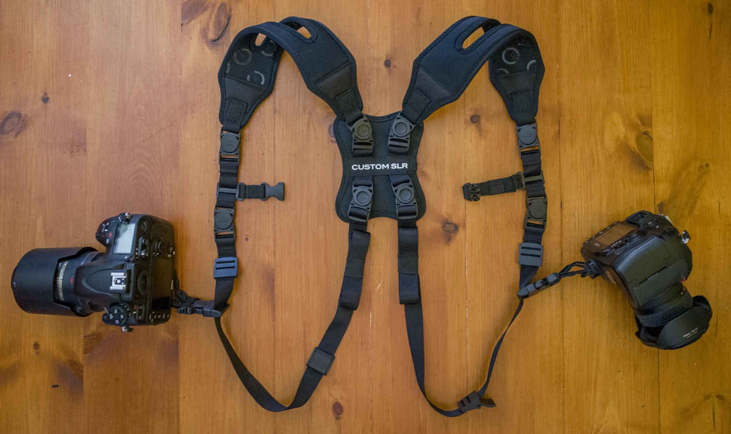 The Custom SLR Dual Camera Strap consists of two of the firm's Glide One Straps which are joined together with a sternum strap and back-pad