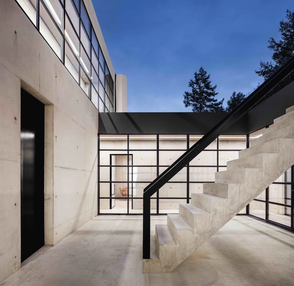 Most of Ghost House is beneath the ground in an area that once served as a sunken garden in a country home but it gets lots of light due to generous glazing, which includes skylights