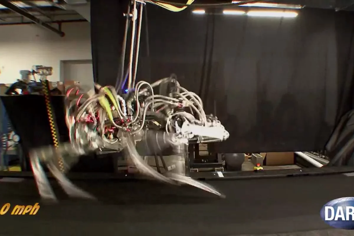 DARPA's quadruped CHEETAH robot has broken the land speed record for legged robots by reaching a gallop of 18 mph on a treadmill