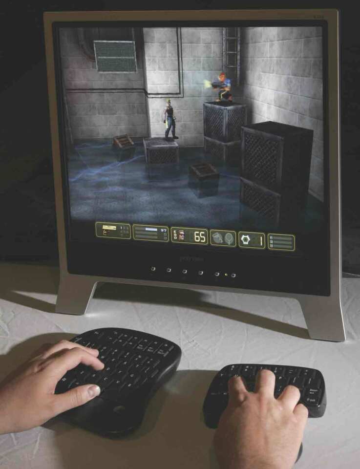 The Combinouse prototype being used to control a first-person shooter
