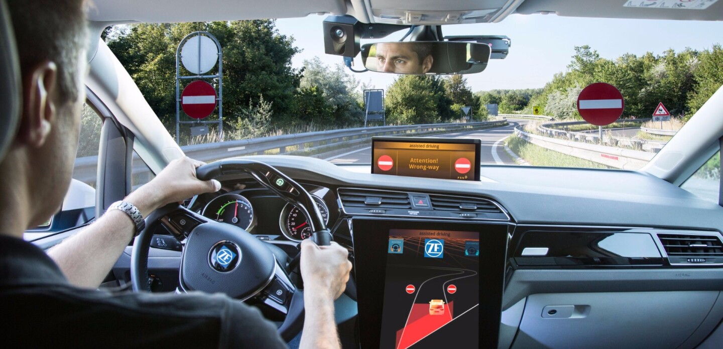 Behind the wheel of a car with wrong-way warning