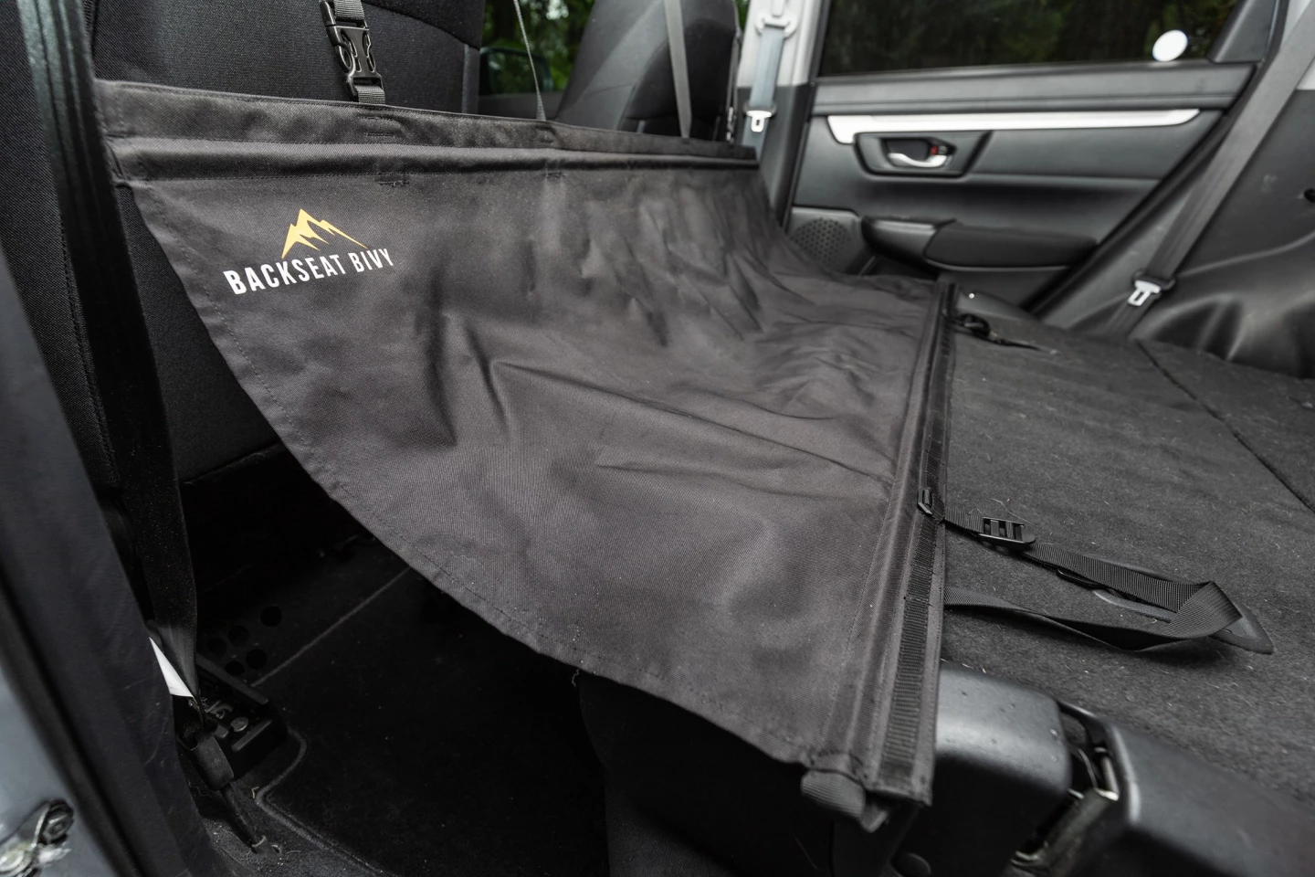 The Backseat Bivy adds 18 in of space to bridge the gap between the front seat backs and folded rear seats