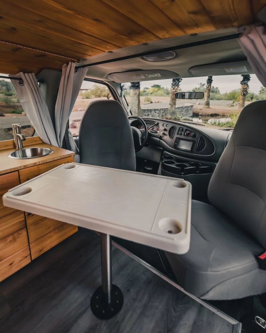 The Boho Iris conversion includes a little removable dining table and swivel front seats