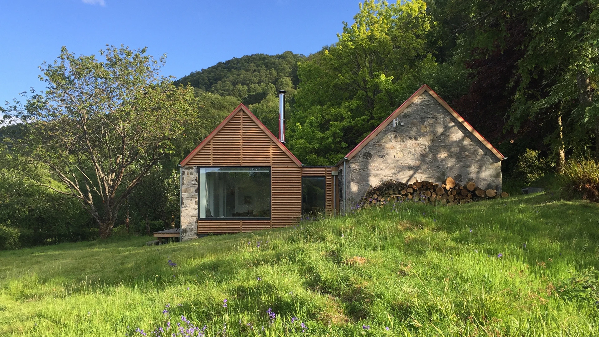 Fernaig Cottage boasts some green cred: it's well insulated, sports an air source heat pump and MVHR system, and involved the re-use of stone