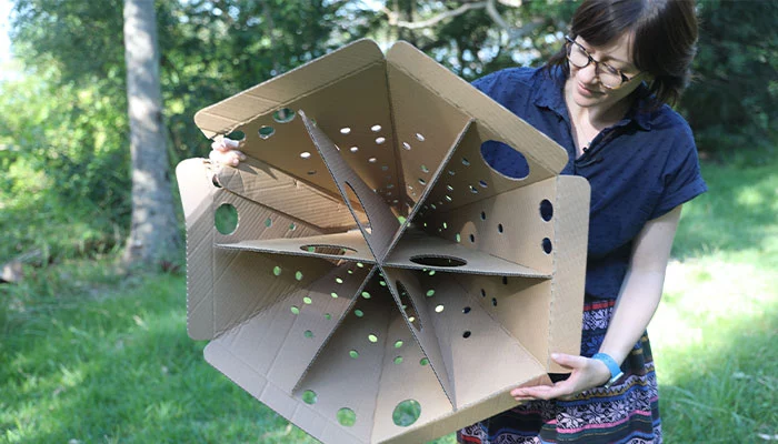 Dr. Alexandra Carthey displays the inside of one of the habitat pods
