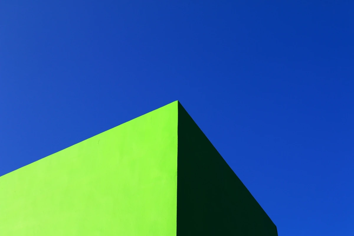 We love the clean lines of this bright green building against a very blue sky