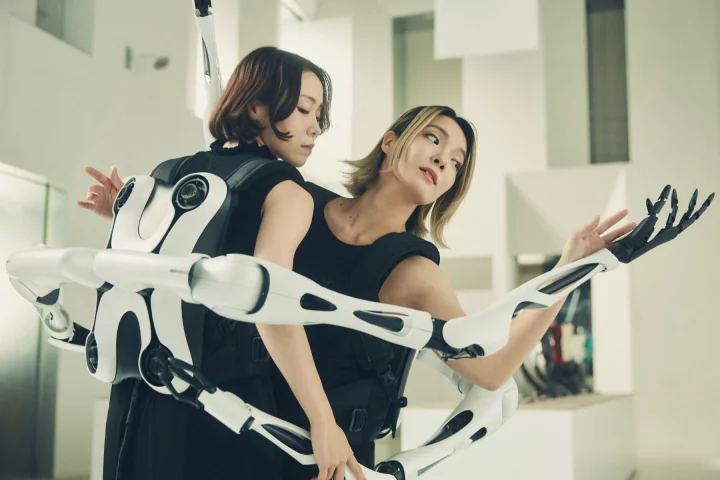 The Jizai Arms supernumerary robotic arm system can accommodate up to six arms per user