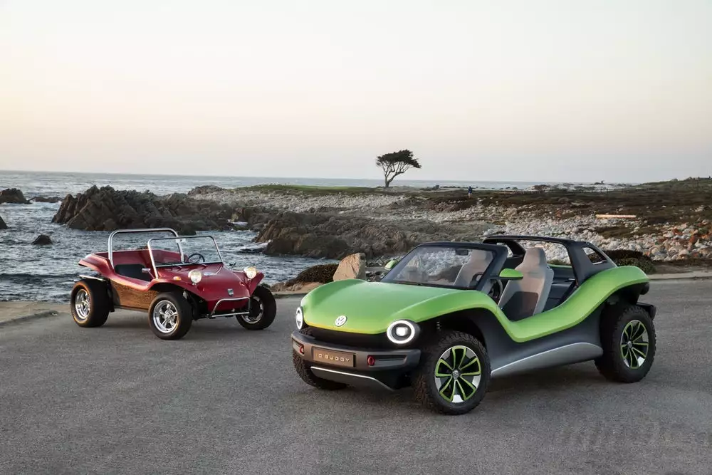 The VW ID. Buggy alongside a Meyers Manx dune buggy