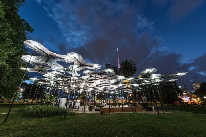 The recently constructed MPavilion sits in parklands in the center of Melbourne's arts precinct