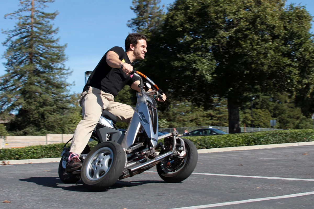 After years in development, Sway Motorsports has unveiled a prototype of its tilting three-wheel electric scooter, one with a rather sportier bent than the tilting electric three-wheelers we've seen before