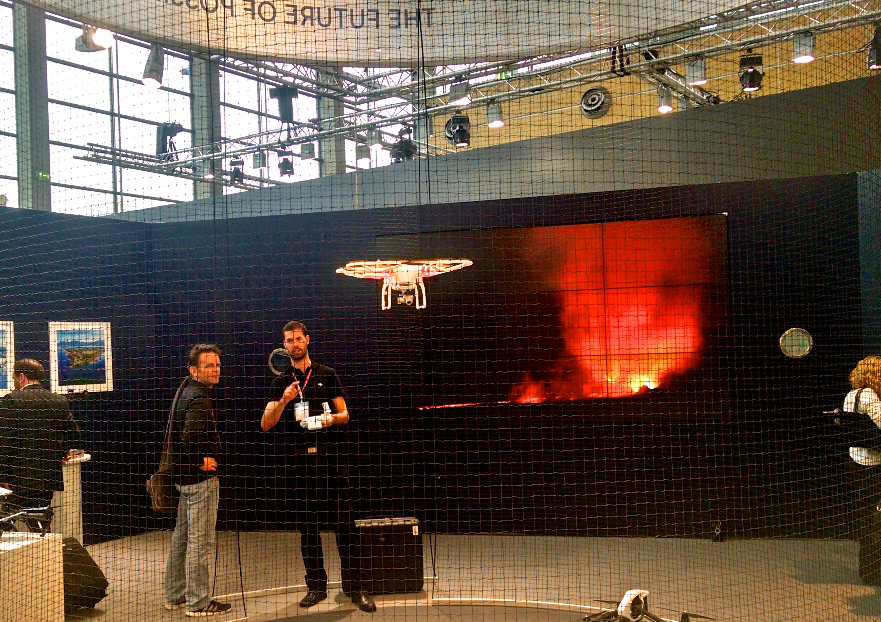 A drone takes flight inside DJI's demo area (Photo: C.C. Weiss/Gizmag)
