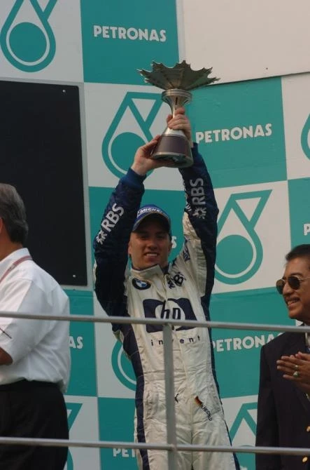 Nick Heidfeld takes to the podium for the first time