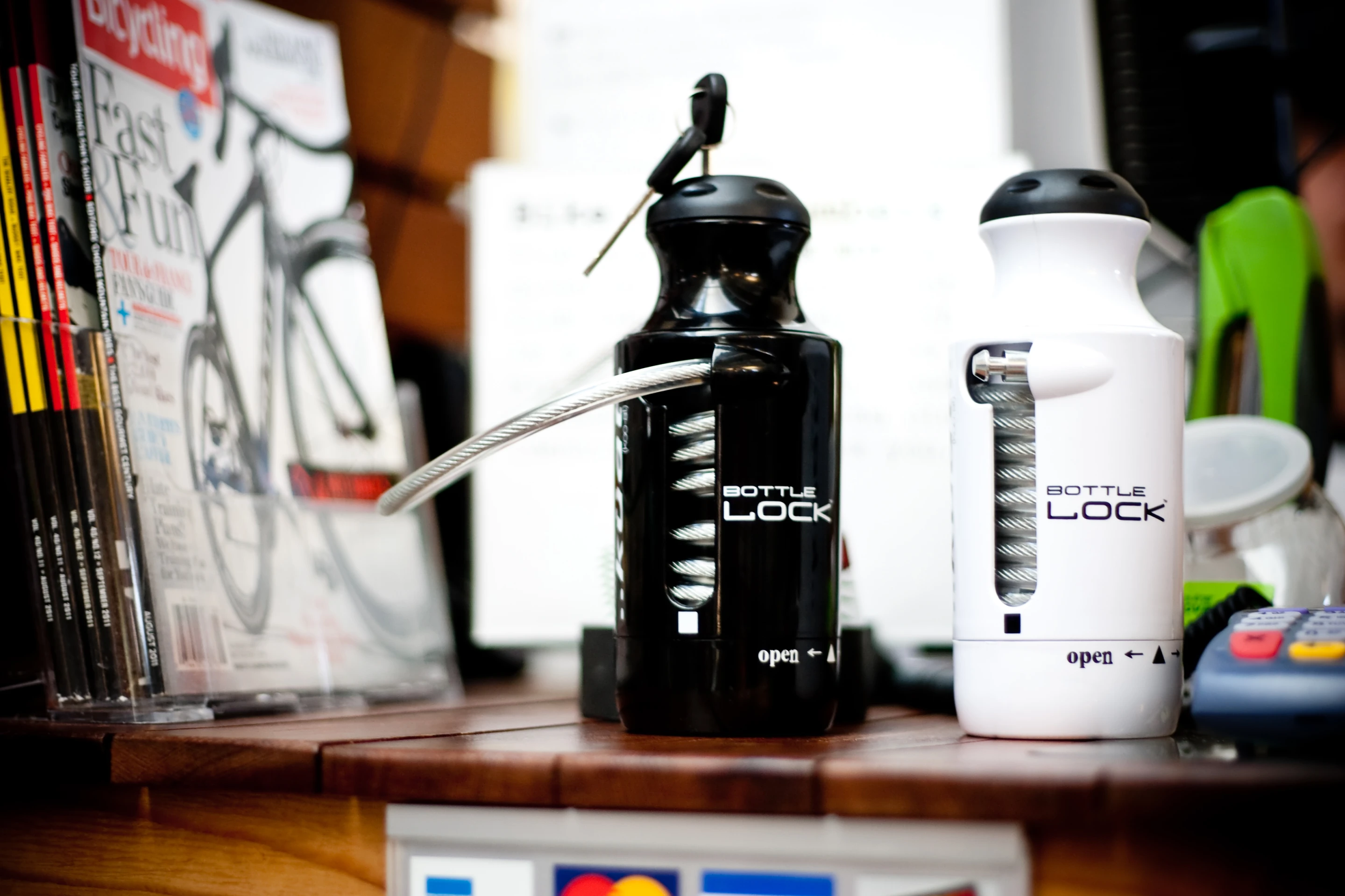 The Kuat Racks Bottle Lock is a bike lock that has the form of a water bottle