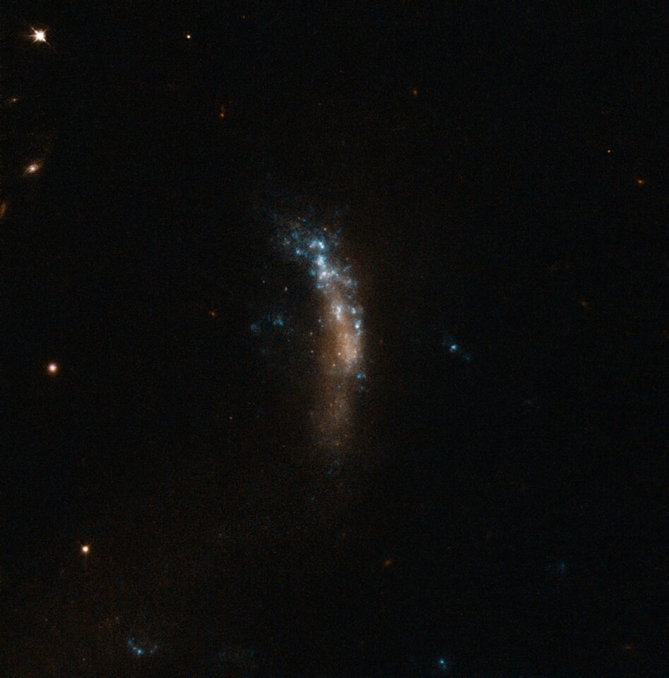 This image, snapped by the Hubble Telescope shows the dwarf galaxy in which SN2010jl went supernova (Image: ESO)