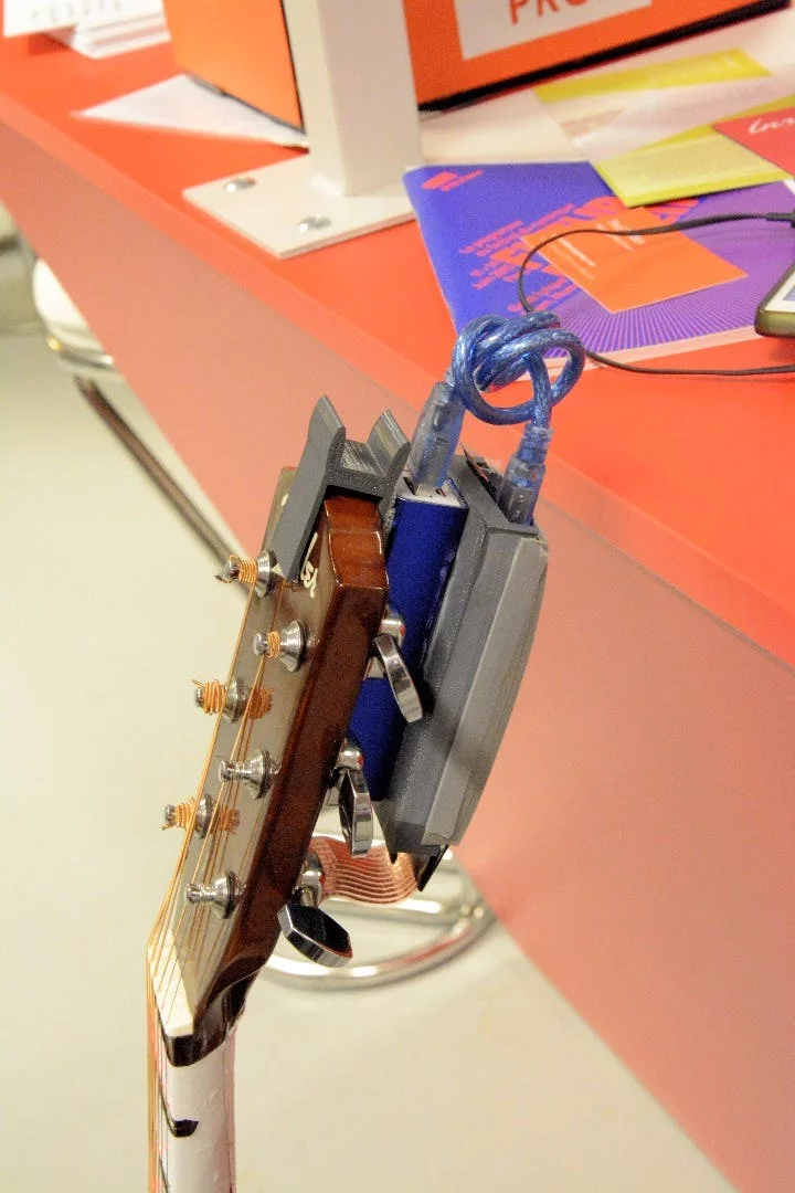 The 2015 FretX prototype had a much chunkier control box compared to the current production unit