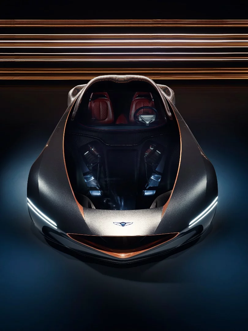 Genesis highlights the chassis, suspension and formula car-like nose cone with the transparent hood panel