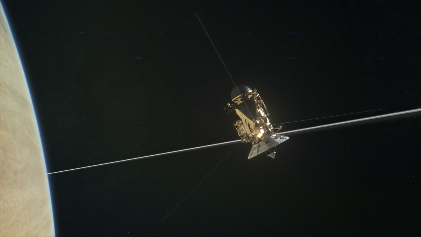 Artist's impression of Cassini passing through Saturn's ring plane