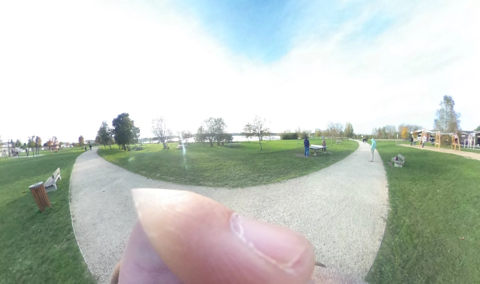 Launching a JPEG image file in a standard photo viewer produces a flattened out, stitched together 6.5 megapixel version of the spherical image seen in Ricoh's proprietary software