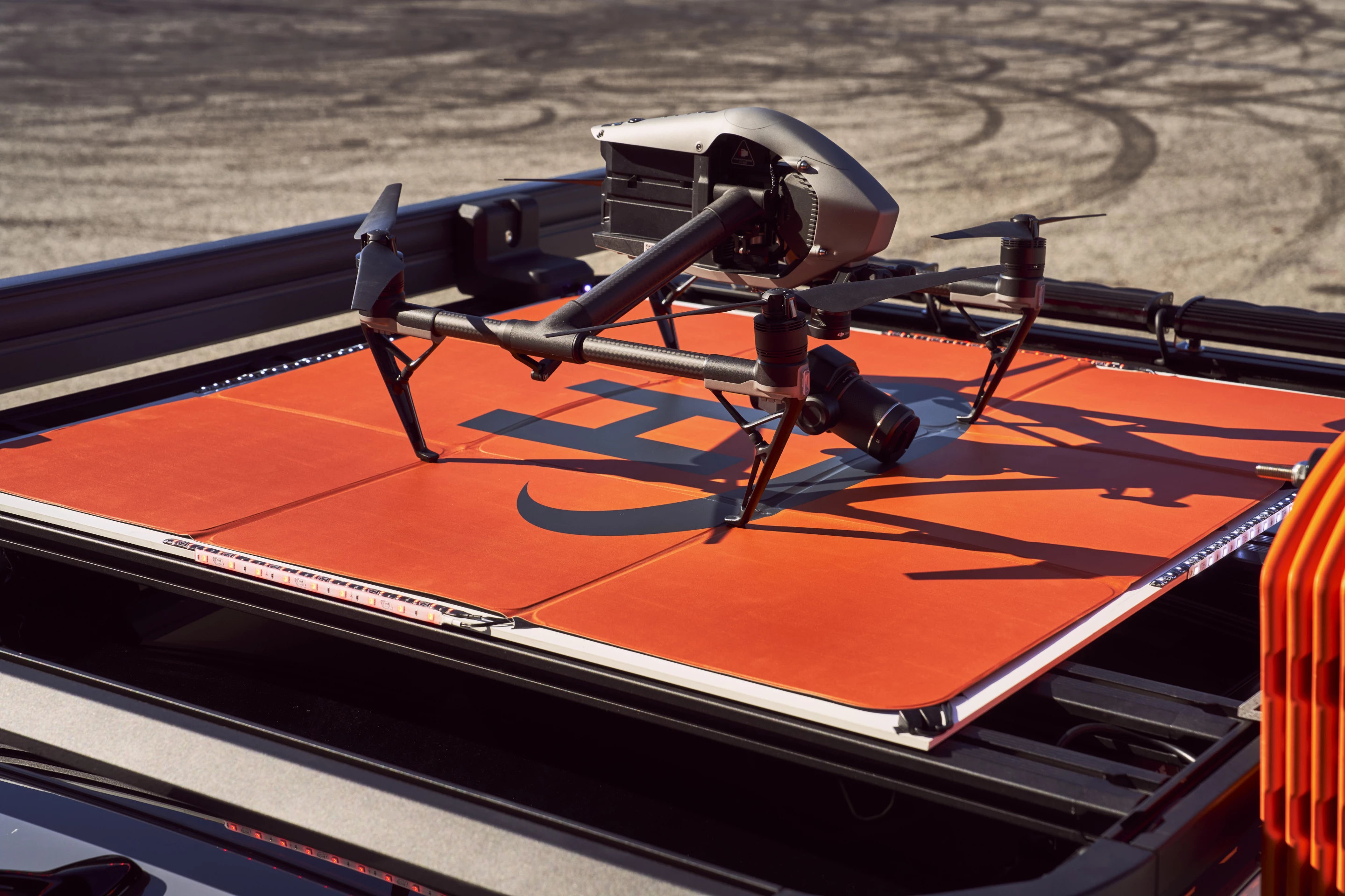 The Volkswagen ID.4 EV Drone Command Concept has the drone launching and landing off a rooftop platform of the EV