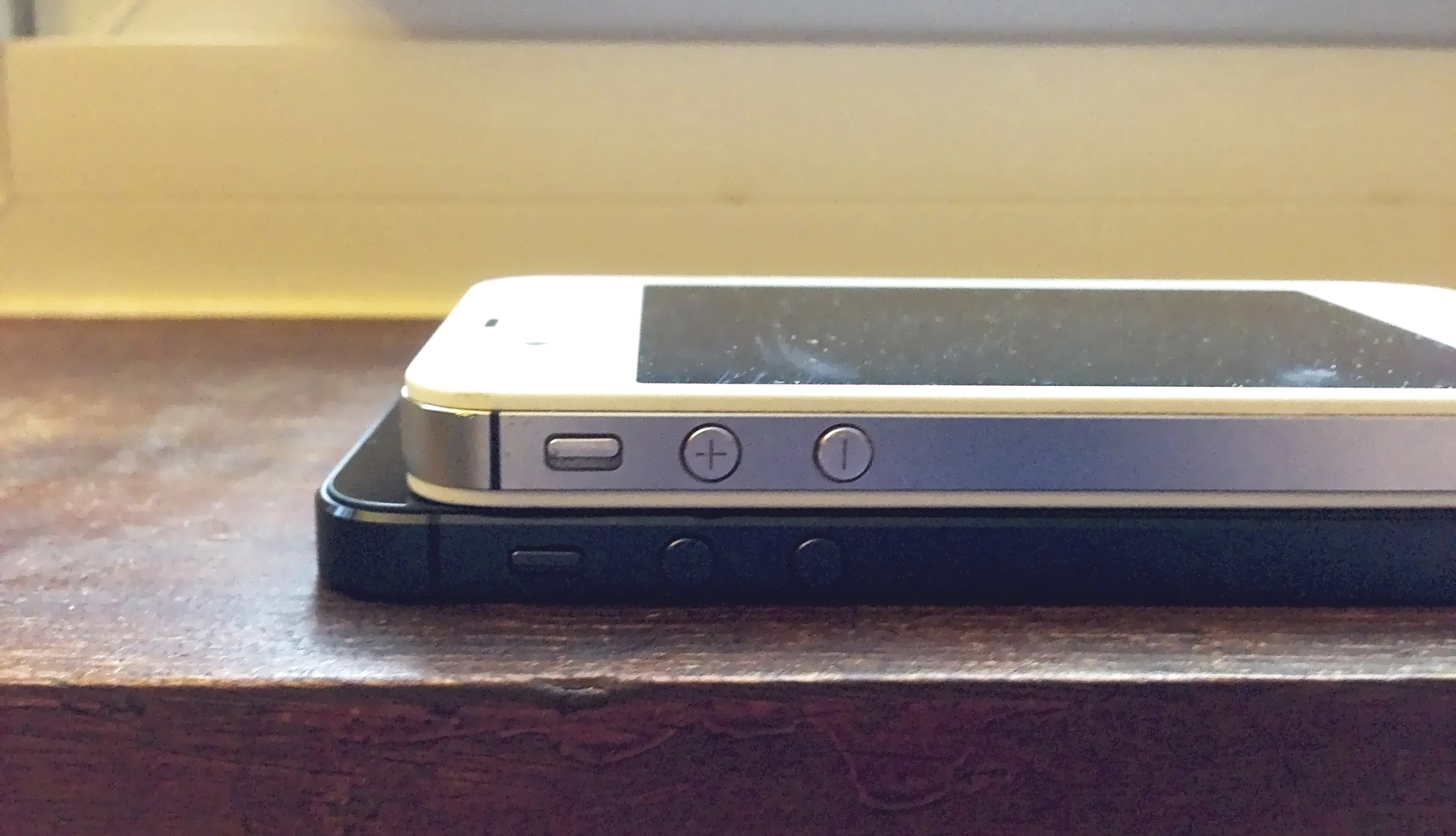 The iPhone 5 (bottom) is 1.7mm thinner than the iPhone 4S.