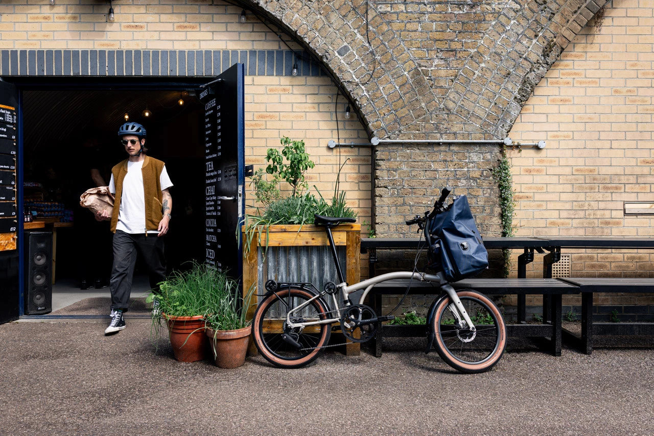 The folding e-Brompton has the footprint of a regular bike, and is designed for city riding as well as out in the wilds