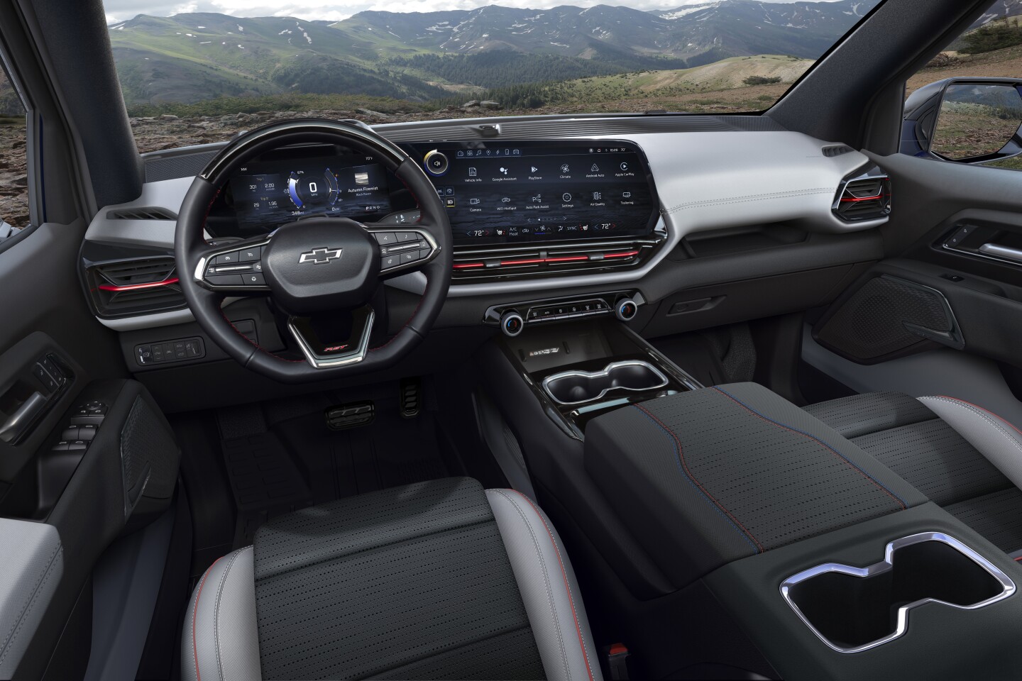 The 2024 Silverado EV RST features a large digital infotainment and instrument panel combo ... and plenty of serious cupholders