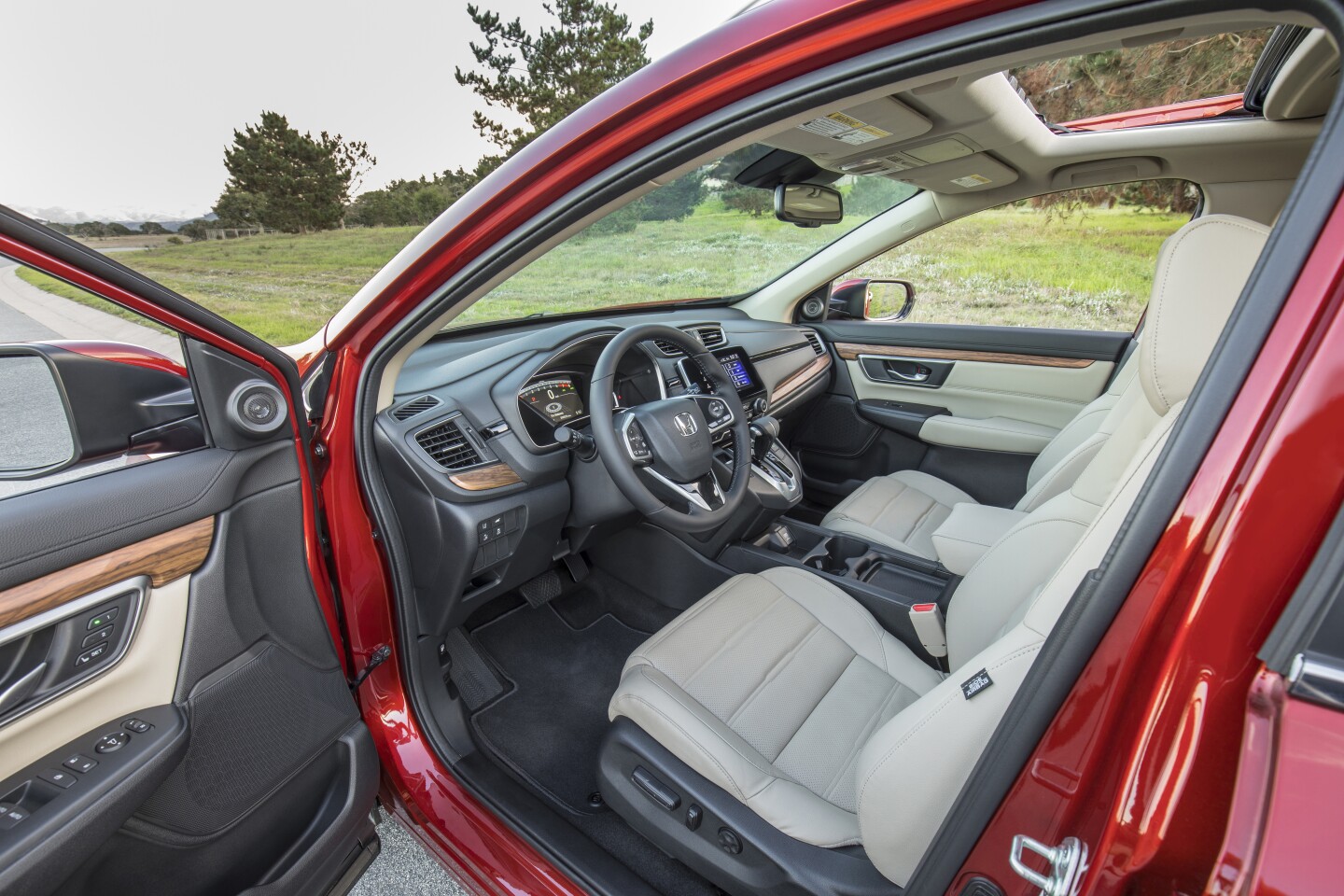 Driver’s controls in the 2018 CR-V are good, but some of the auxiliary controls and gauges aren’t placed well