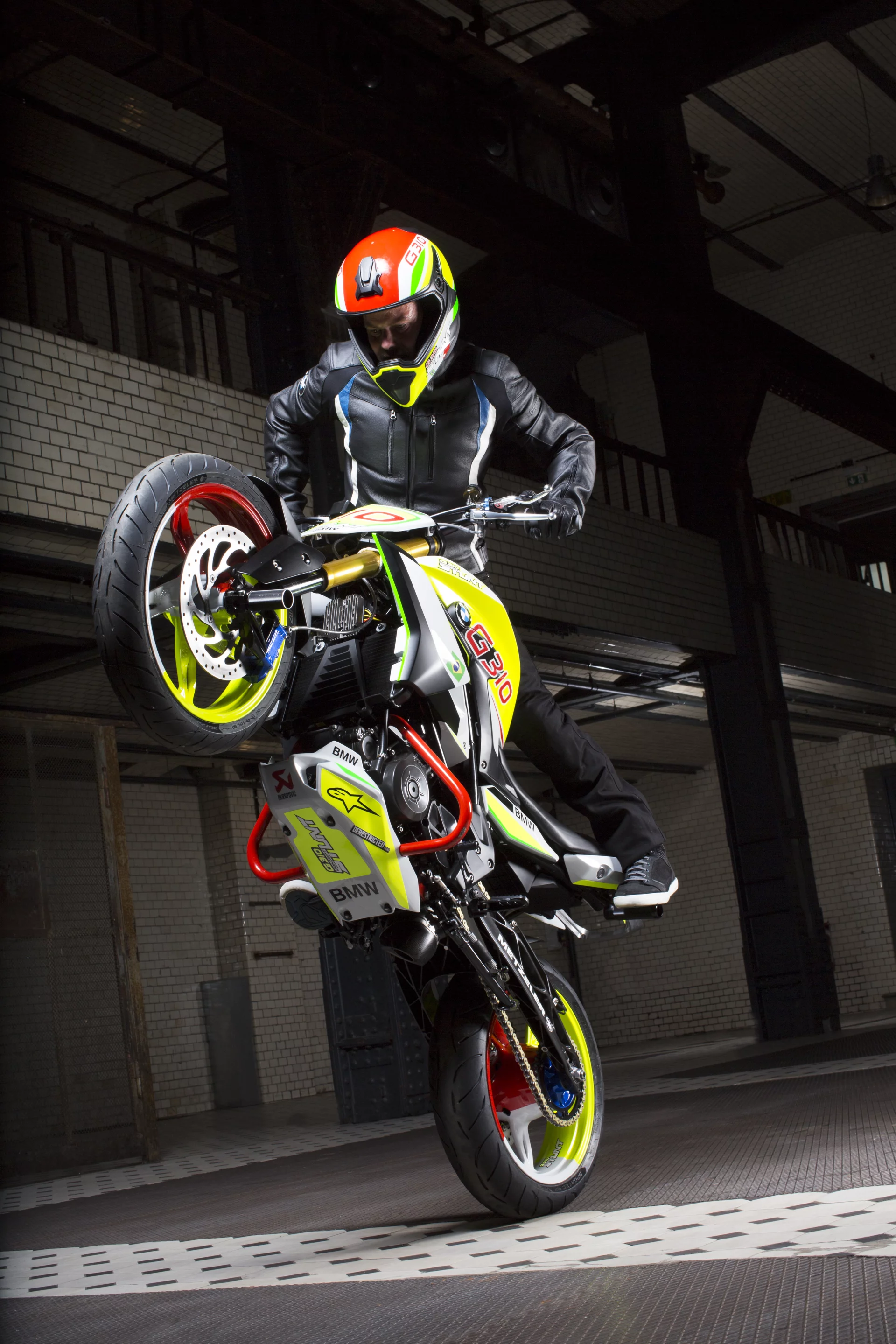 Christian Pfeiffer rides the BMW Concept Stunt G 310: stand-up wheelie