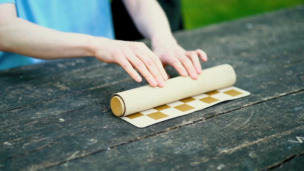 The Crownes Chess Set puts everything you need for a game in a convenient cylinder