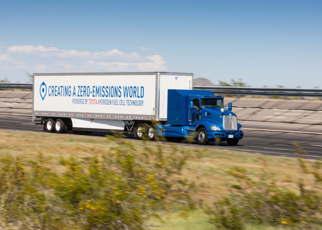 The truck has two fuel cell stacks from the Mirai hydrogen fuel cell car, hydrogen storage tanks, a 12 kWh battery, and heavy-duty electric motors on board