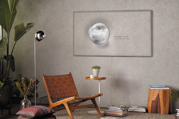 Samsung's new wall-mounted QLED TVs have an Ambient Mode that mimics the pattern behind them, allowing them to blend into the background