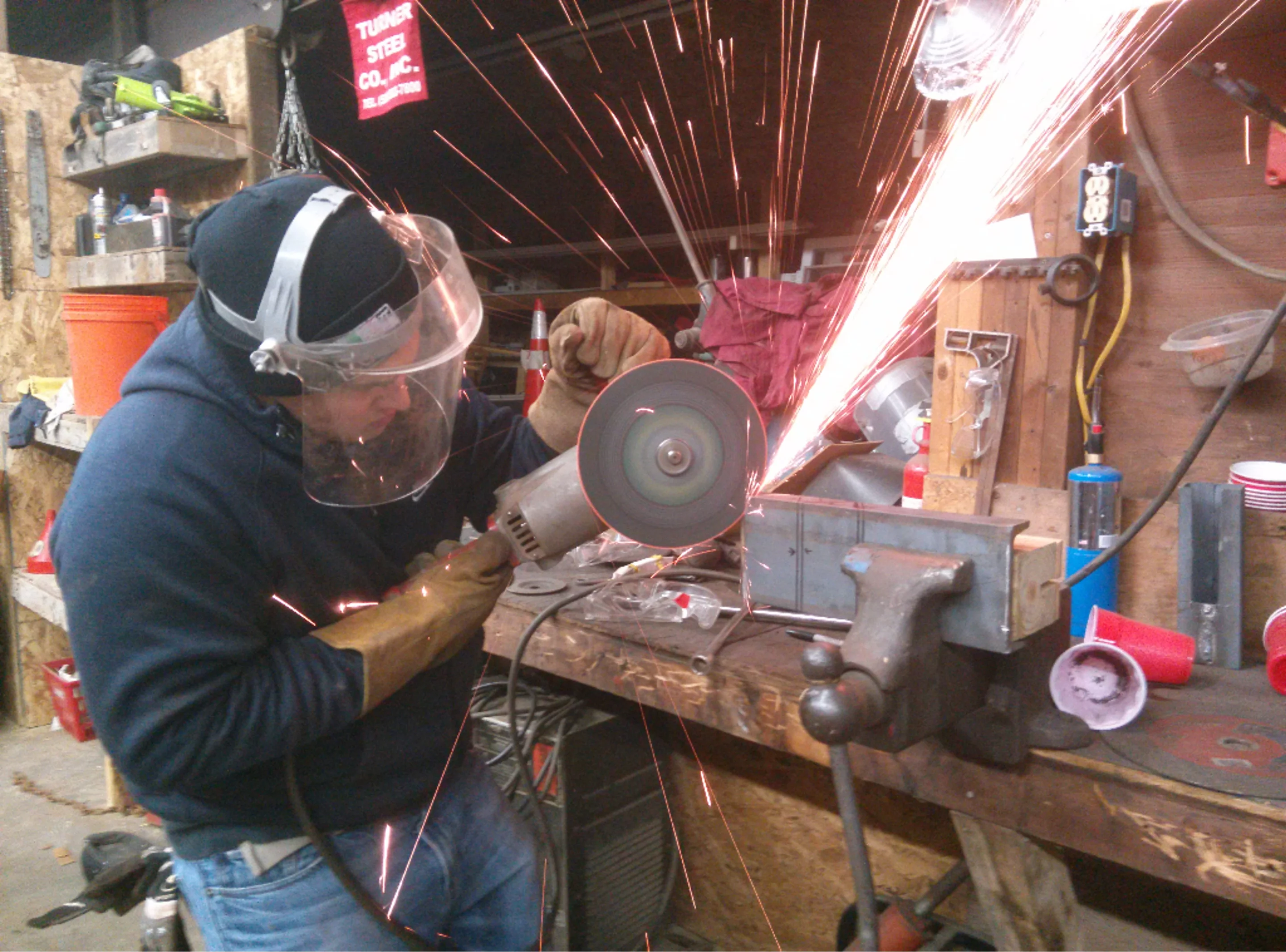 Student working on parts for Atlas, the test stand for the Mk V