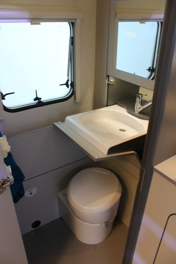 The fold-down bathroom sink helps save space