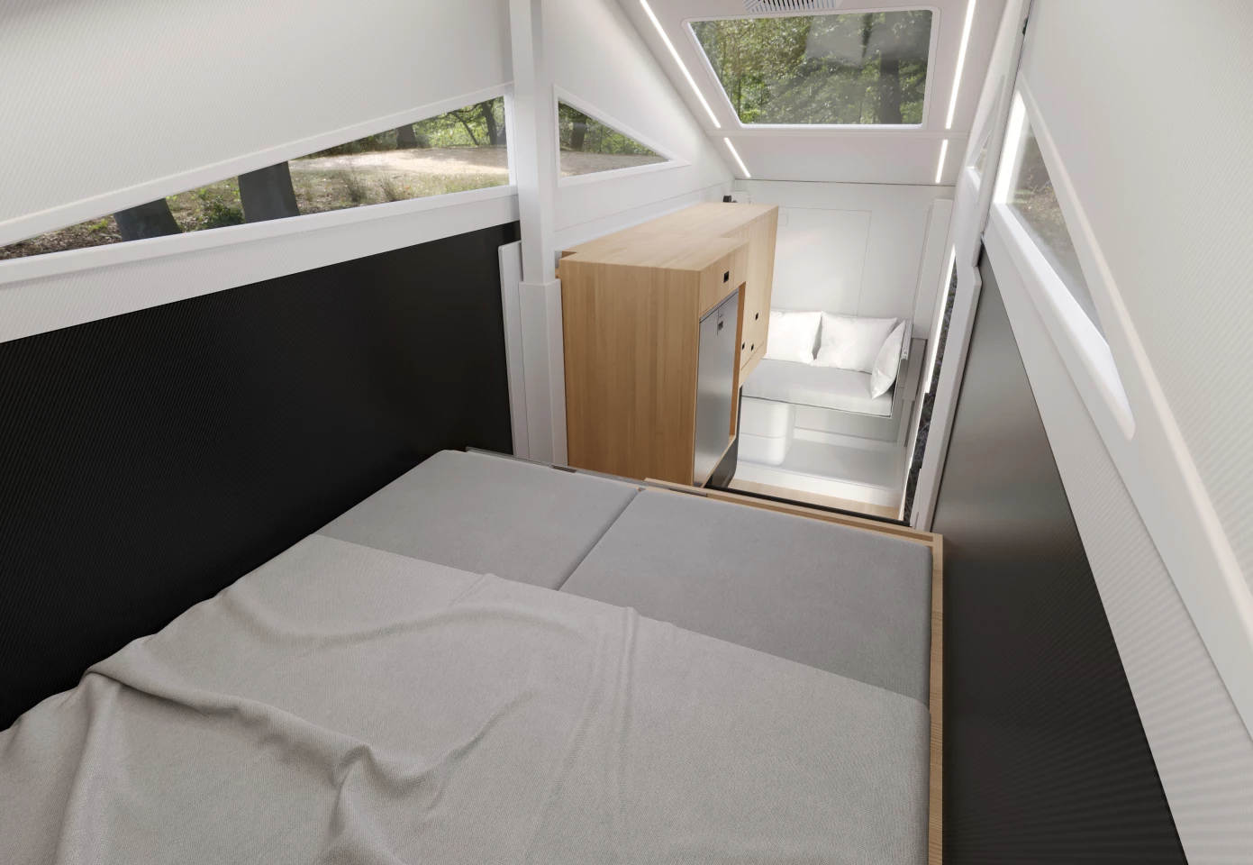 What starts as a cargo box in the pickup bed becomes a cozy micro-home