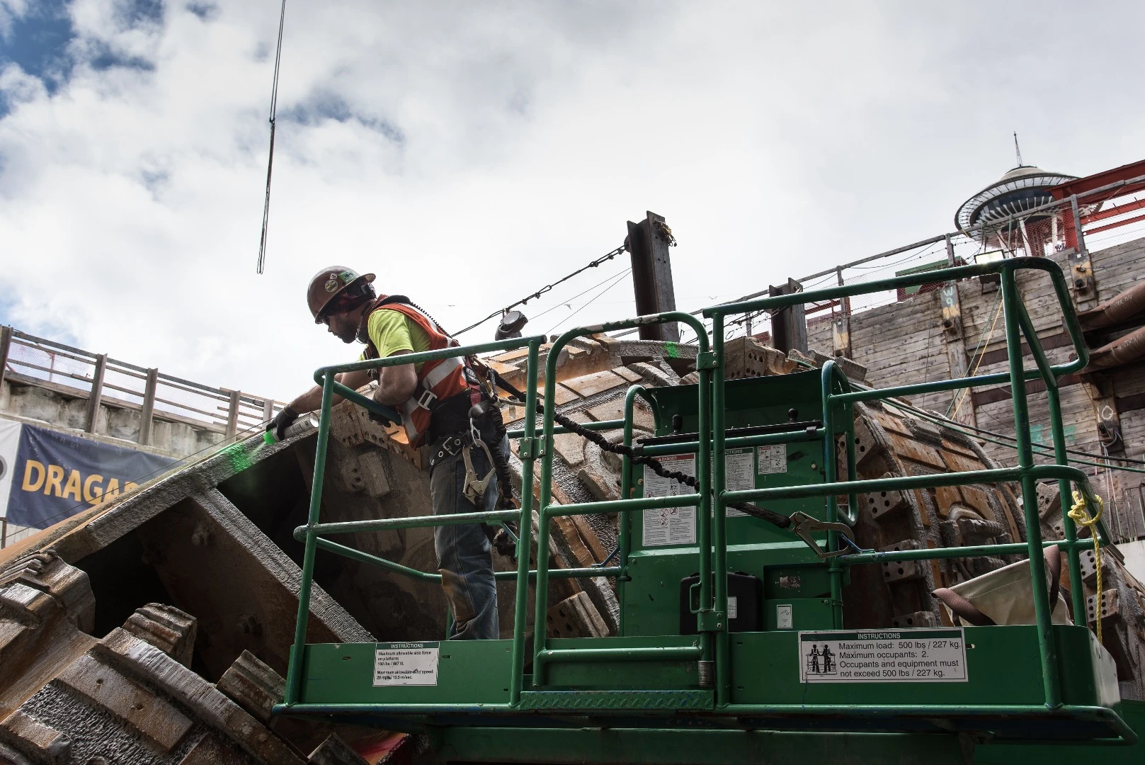 A workman dismantling the cutterhead
