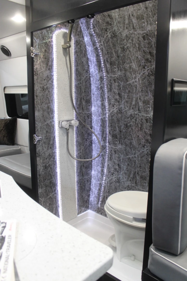 A rather vibrant bathroom inside a second Regency National Traveler van