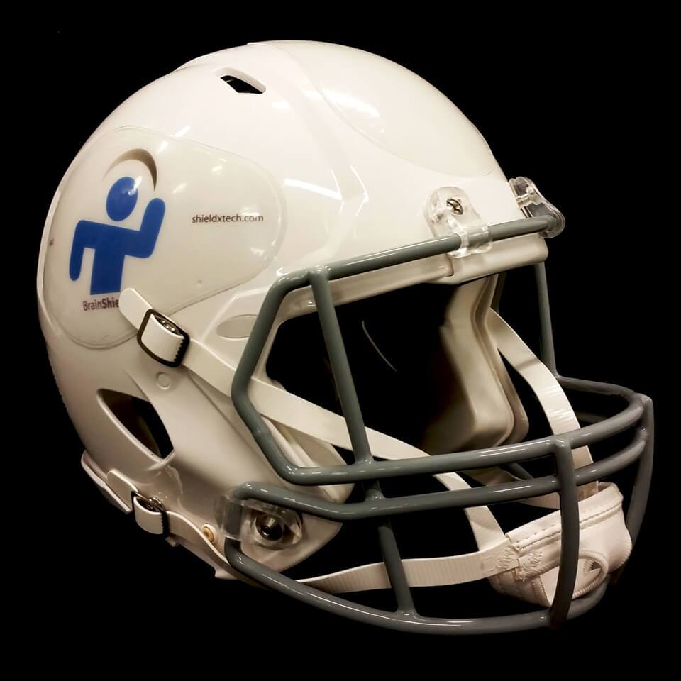 Applied to key areas of a regular helmet, the 1-mm-thick BrainShield decal is composed of four layers