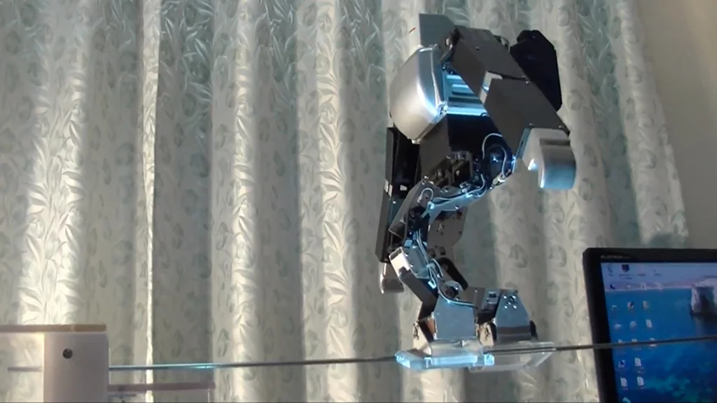 Dr. Guero's Primer-V4 robot works its way across the tightrope